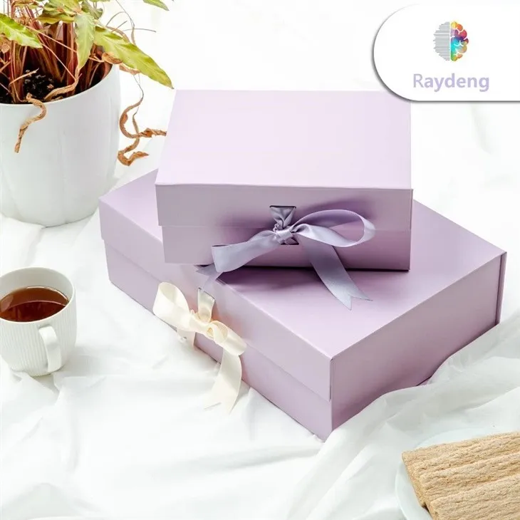 purple folding boxes with ribbon bows