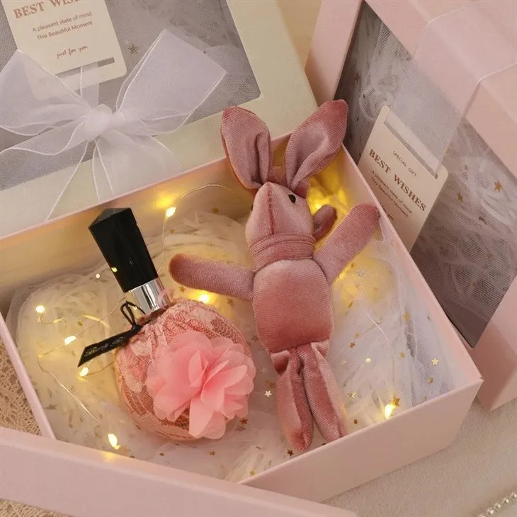 Coffret cadeau avec nœud en ruban multicolore